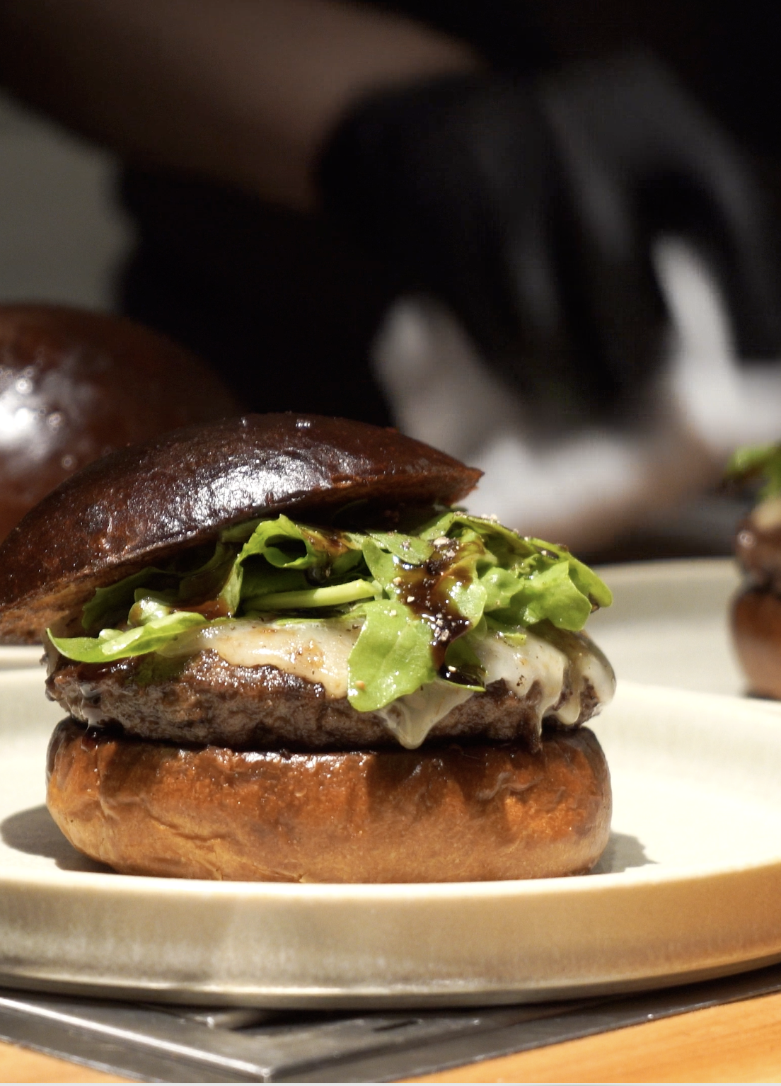 The Gui's Burger × Kitan Hibiki Wagyu burger with provolone and balsamic cream